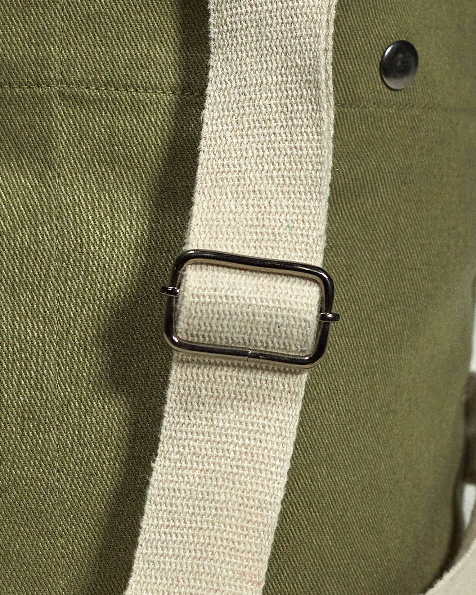 Focus on adjustable, extra strong natural cotton webbing shoulder strap of Uskees #0402 bucket bag.