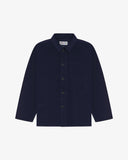 Front, flat shot of an Indigo blue corduroy overshirt buttoned up presented on a light gray background
