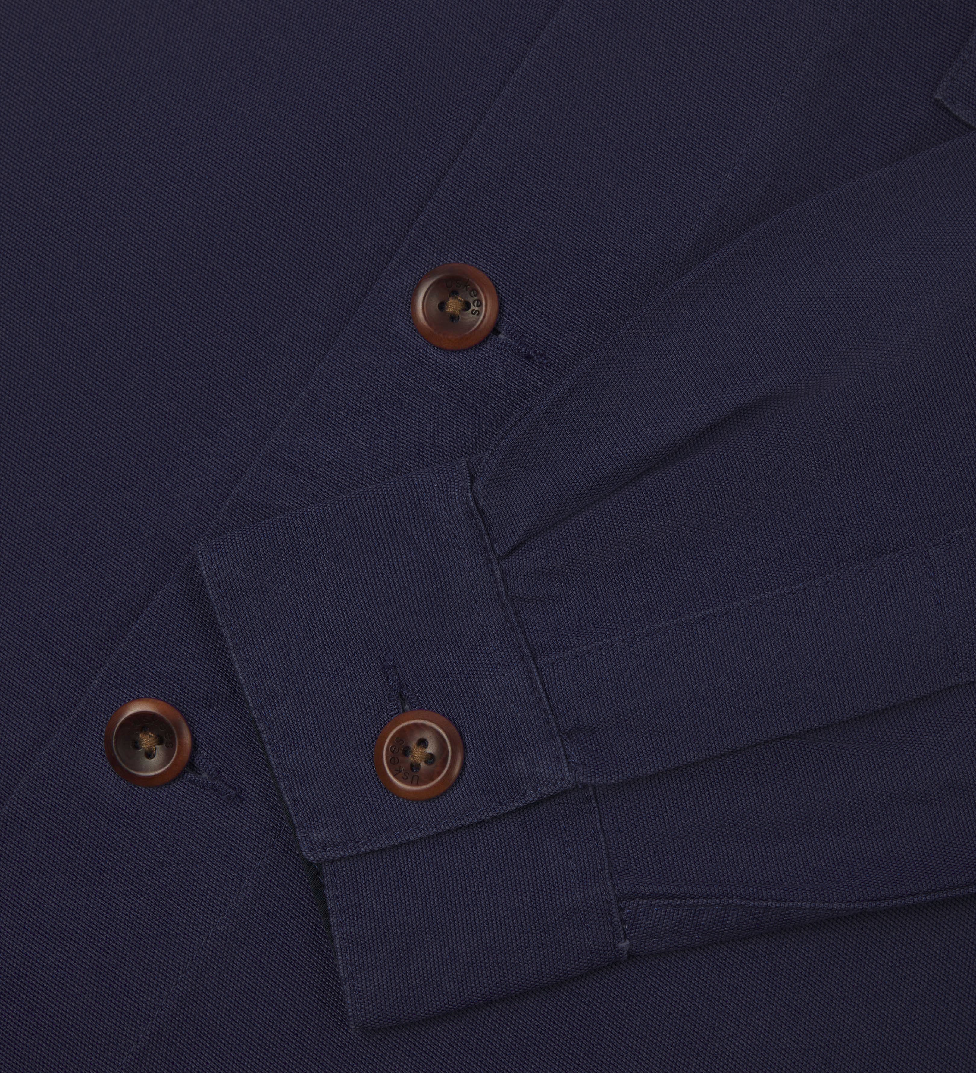 sleeve detail and corozo buttons.