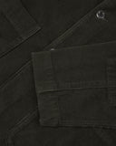 Close-up view of cuff, placket and corozo buttons of green-brown (seaweed) blazer from Uskees and providing a clearer view of the 11 wale organic corduroy.