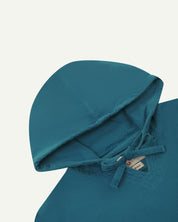 Close front flat shot of uskees mid-blue men's organic cotton smock showing hood.