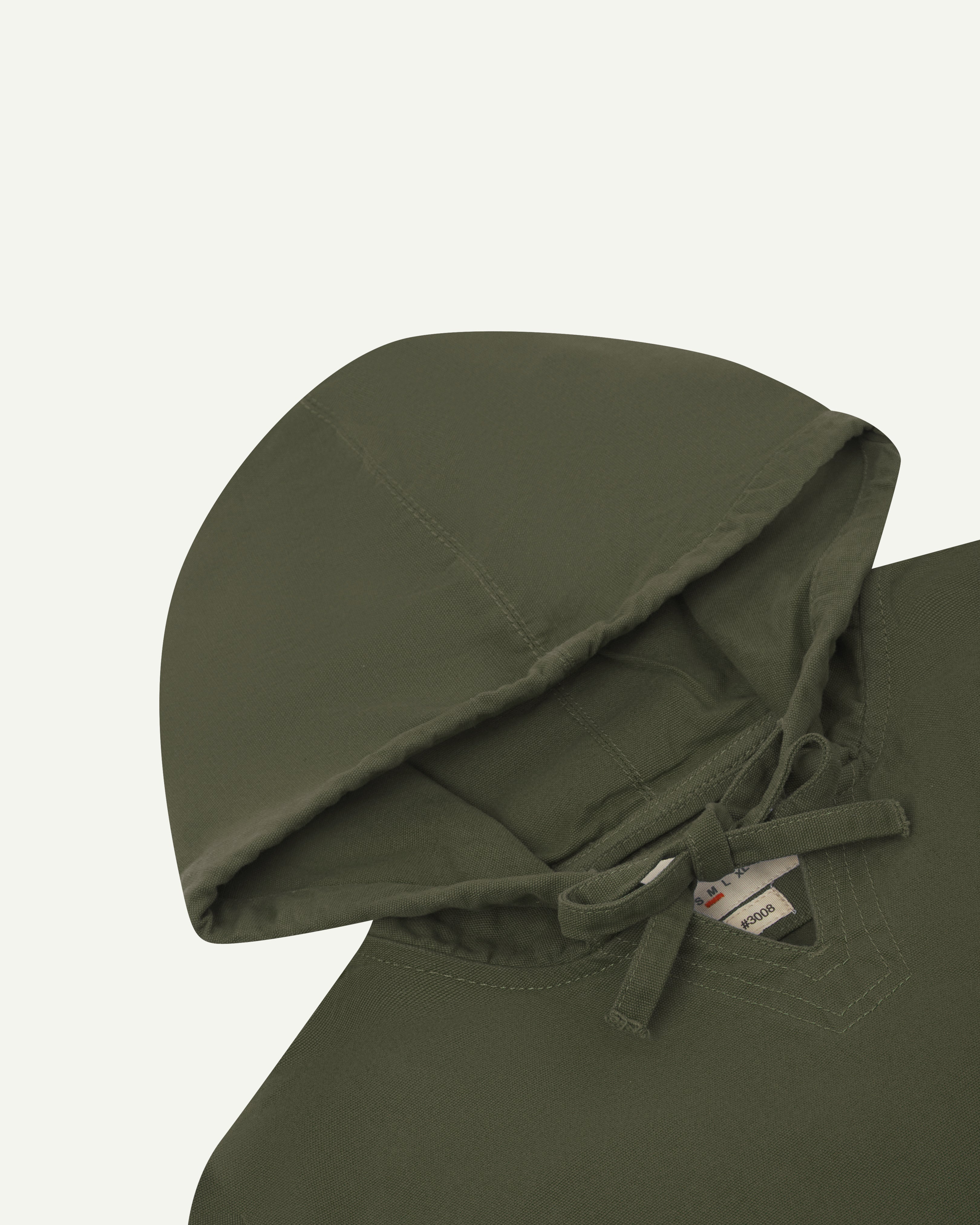 front flat close-up shot of uskees dark green men's organic cotton smock showing hood and ties