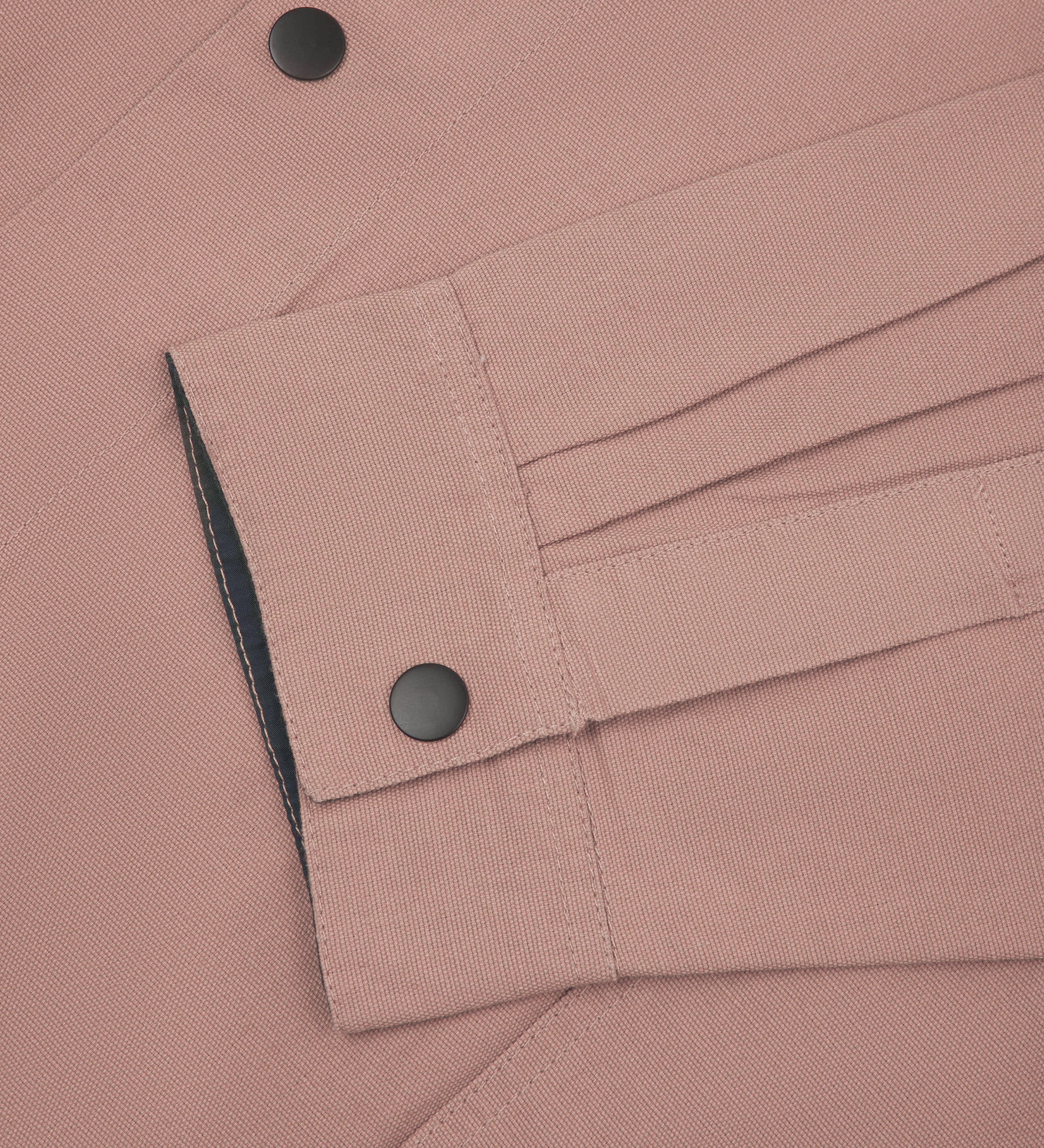 Close up shot of dusty pink #3013 coach jacket from Uskees