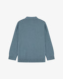 Flat back view of knitted organic cotton blue-grey collared cardigan from Uskees with view of ribbed cuffs and waistband.