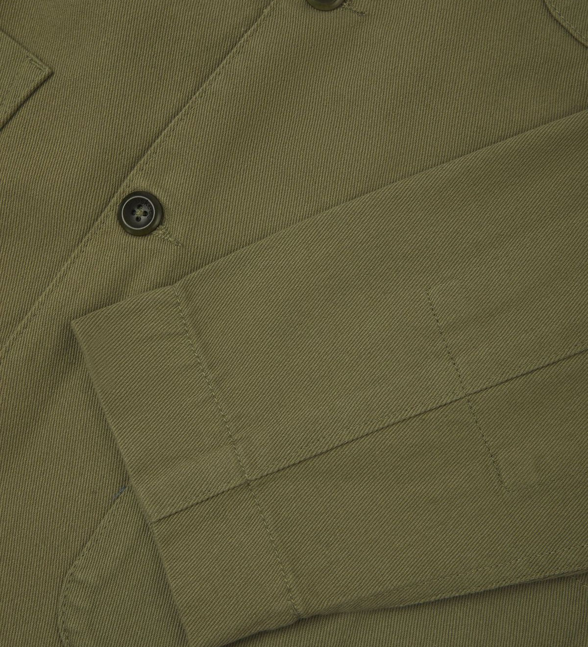 Close-up view of sleeve and buttons -  moss-green organic cotton drill blazer for men