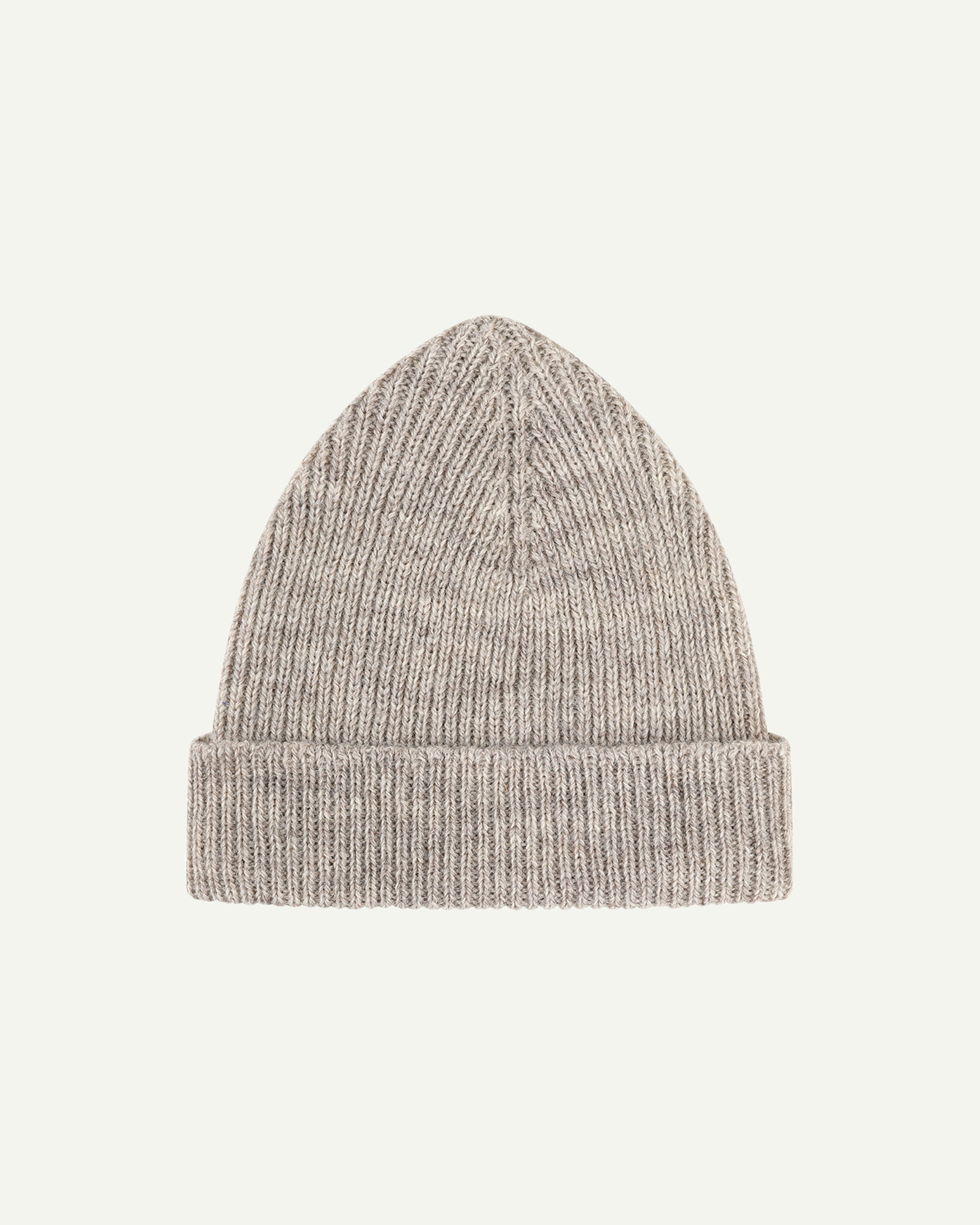 Flat view of Uskees 4005 undyed 'oat' soft beige coloured wool hat, with clear view of adjustable cuff.