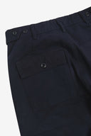 Close up back shot of Uskees 5005 twill workwear pants in deep blue with focus on back pocket, adjustable waistband secured with Corozo button and belt loops.