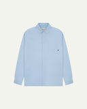Flat front view of sky blue organic cotton Oxford shirt from Uskees. Clearly showing loose fit and 8-button front.
