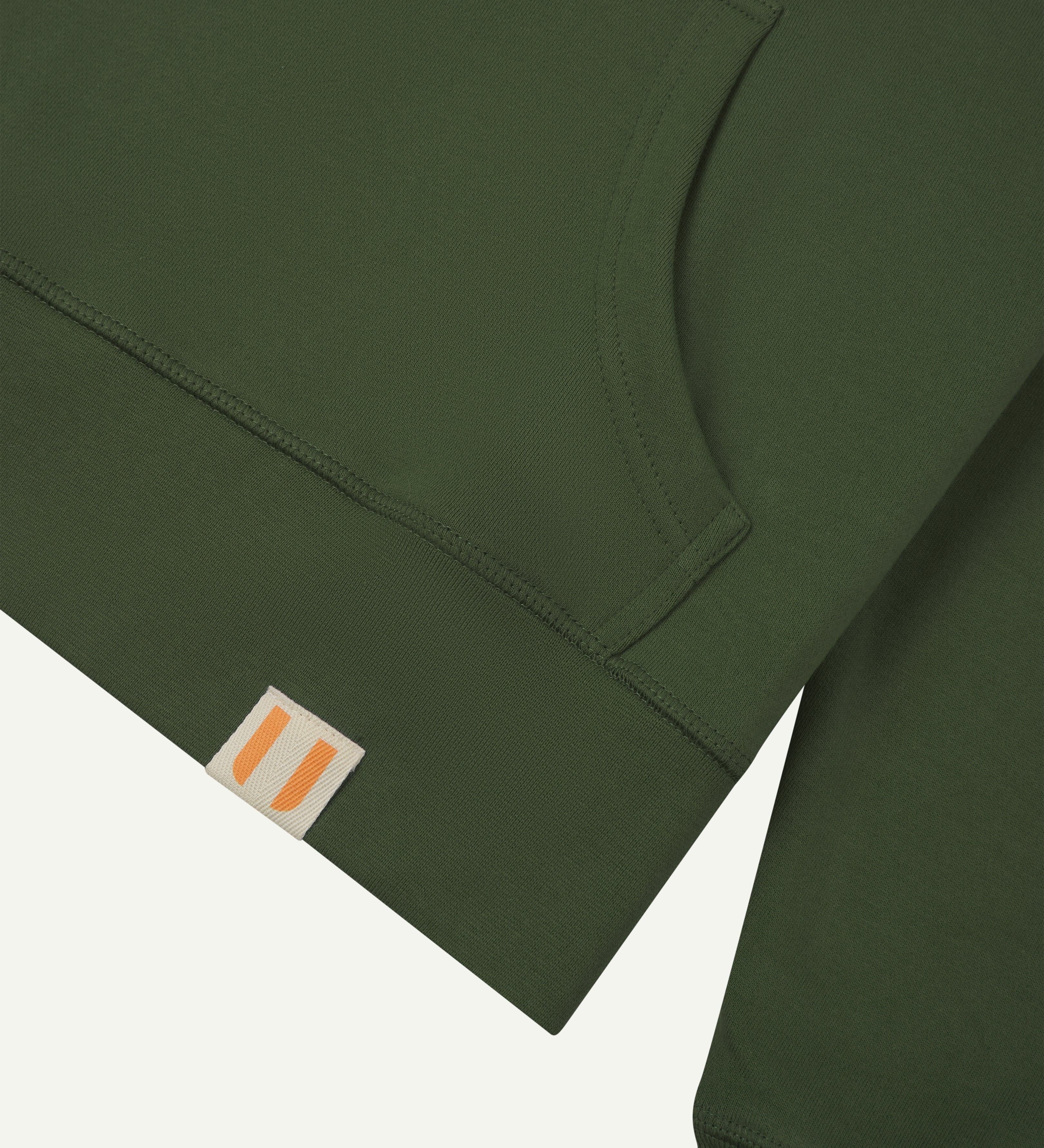Front close view of uskees green hoodie for men with clear view of  brand logo and kangaroo front pocket
