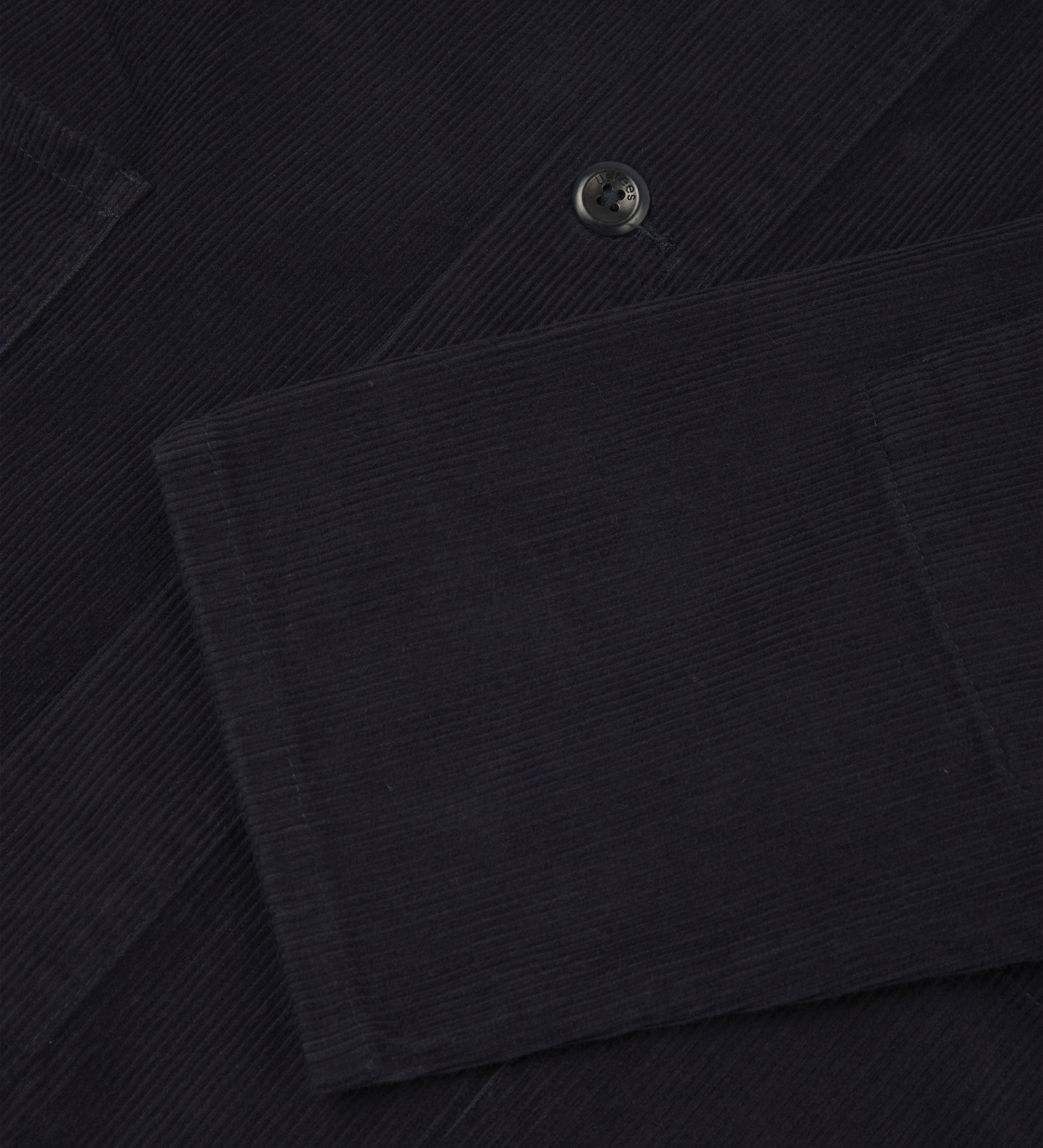 Close up shot of Uskees dark blue corduroy 3001 over-shirt  showing sleeve detail