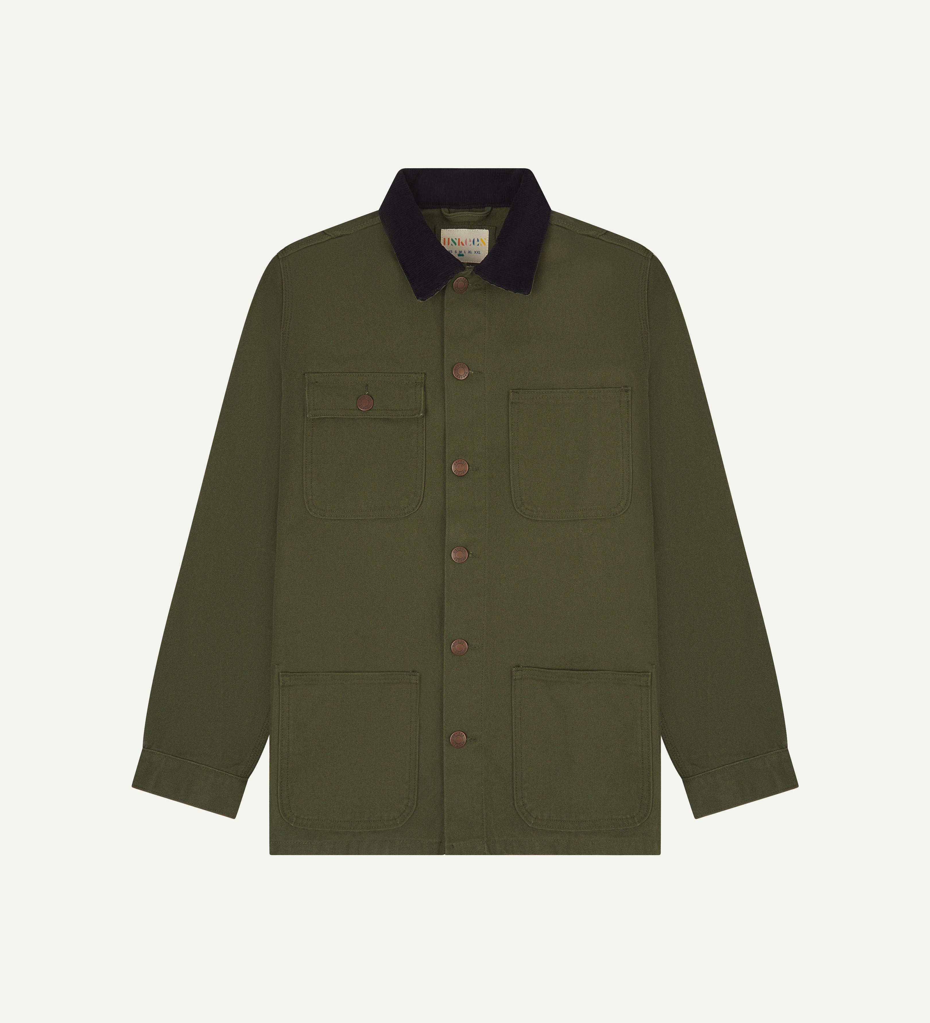 Front flat shot of uskees cotton canvas chore jacket in coriander green with a navy blue collar. Clear view of the pockets and buttons.