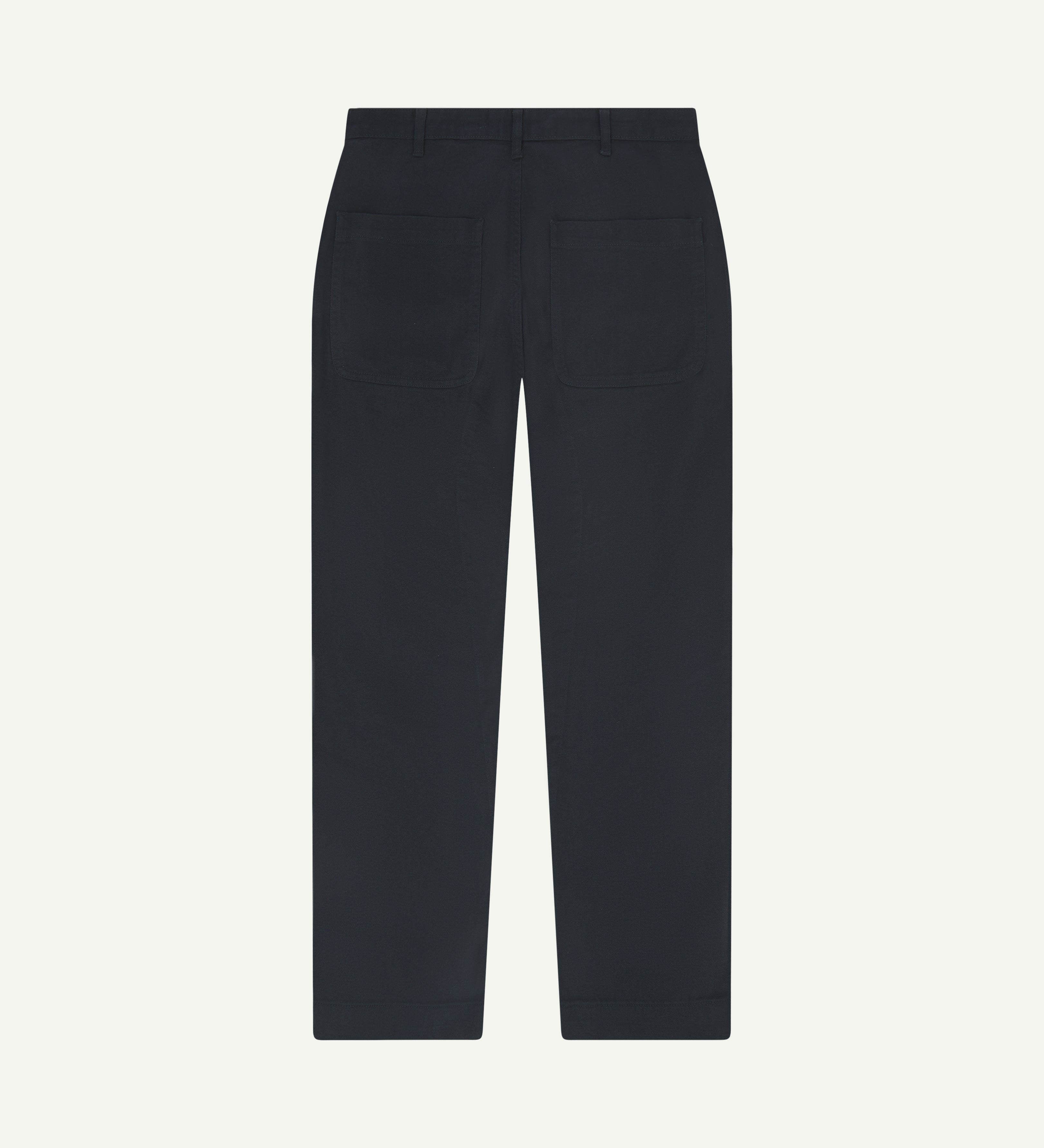 Back view of uskees cotton drill 'commuter' trousers for men in dark blue showing back pockets