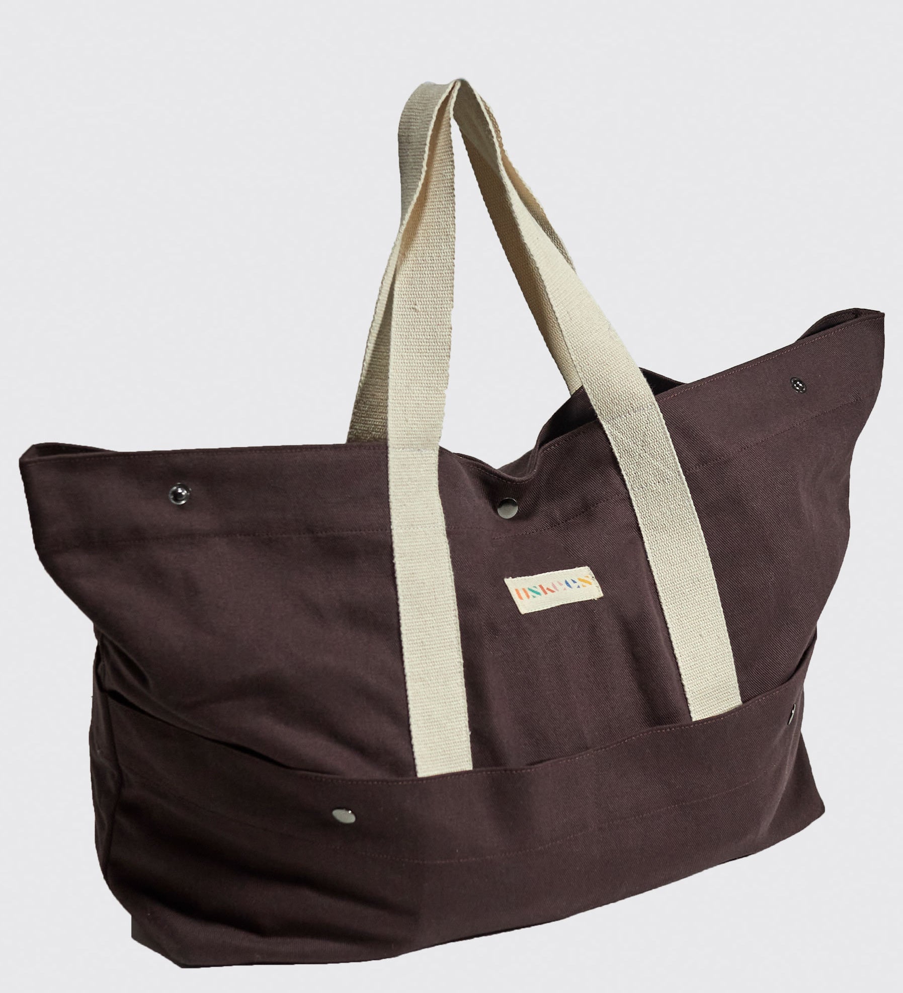 Full-length side view of Uskees #0401 basin bag in cotton drill, clearly showing the basin shape and carry handles.