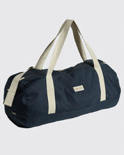 Full-length side view of Uskees #0403 barrel bag, clearly showing the barrel shape, and both shoulder and carry handles.