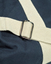 Focus on adjustable, extra strong natural cotton webbing shoulder strap of Uskees #0403 barrel bag.