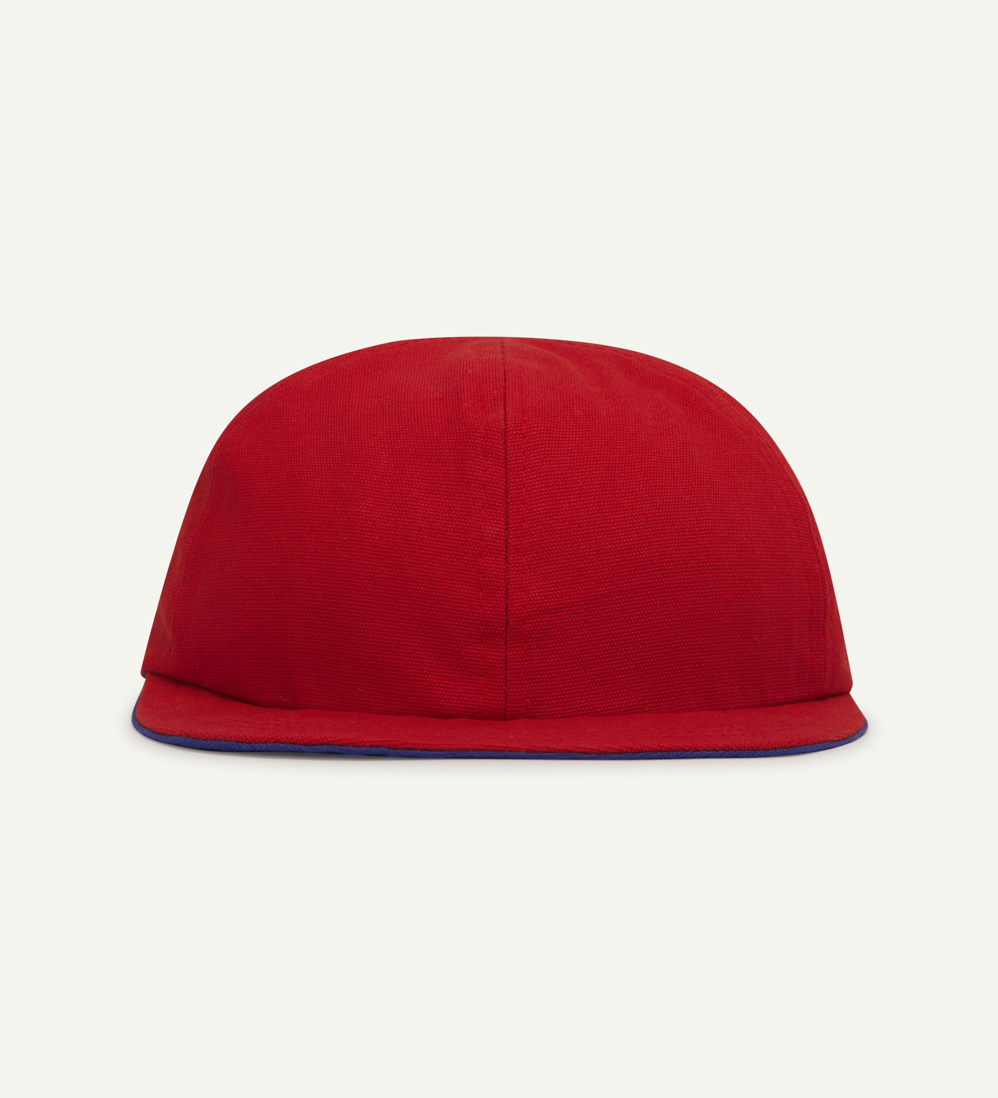 Front view of Uskees deadstock 6-panel cap in bright red showing front peak.