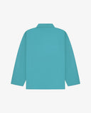 Back view of aqua-blue, buttoned organic cotton overshirt with view of reinforced elbow area and boxy silhouette.