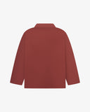 Reverse of chestnut-brown buttoned organic cotton drill overshirt from Uskees. Showing reinforced elbows and boxy silhouette.