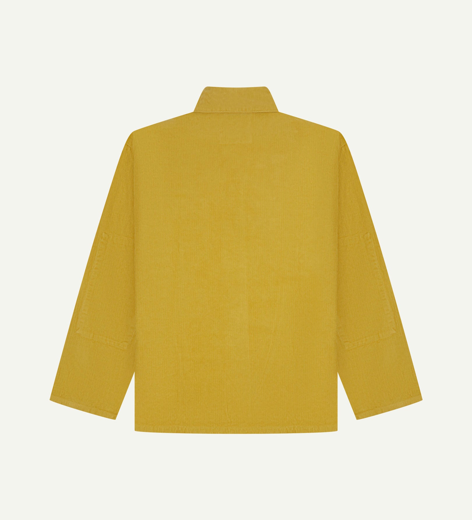Back view of yellow (citronella), buttoned corduroy overshirt with view of reinforced elbow area and boxy silhouette.