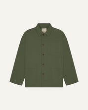 Front flat shot of coriander-green, buttoned organic cotton overshirt. Clear view of chest and hip pockets, corozo buttons and Uskees branding label.