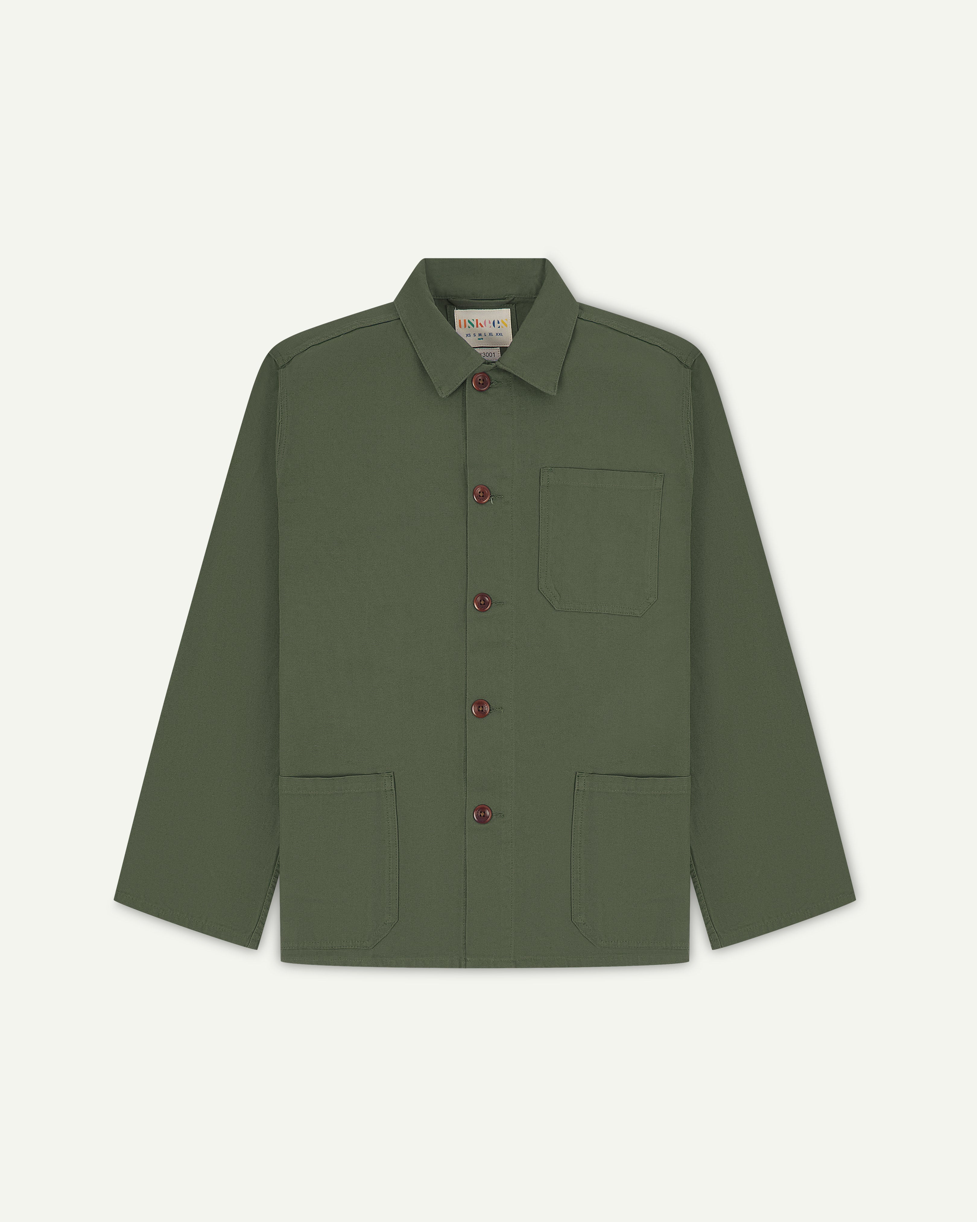 Front flat shot of coriander green men's overshirt with buttons done up and showing uskees neck label