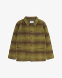 Front flat shot of woodland green check, buttoned Pennine wool overshirt. Clear view of chest and hip pockets, corozo buttons and Uskees branding label.