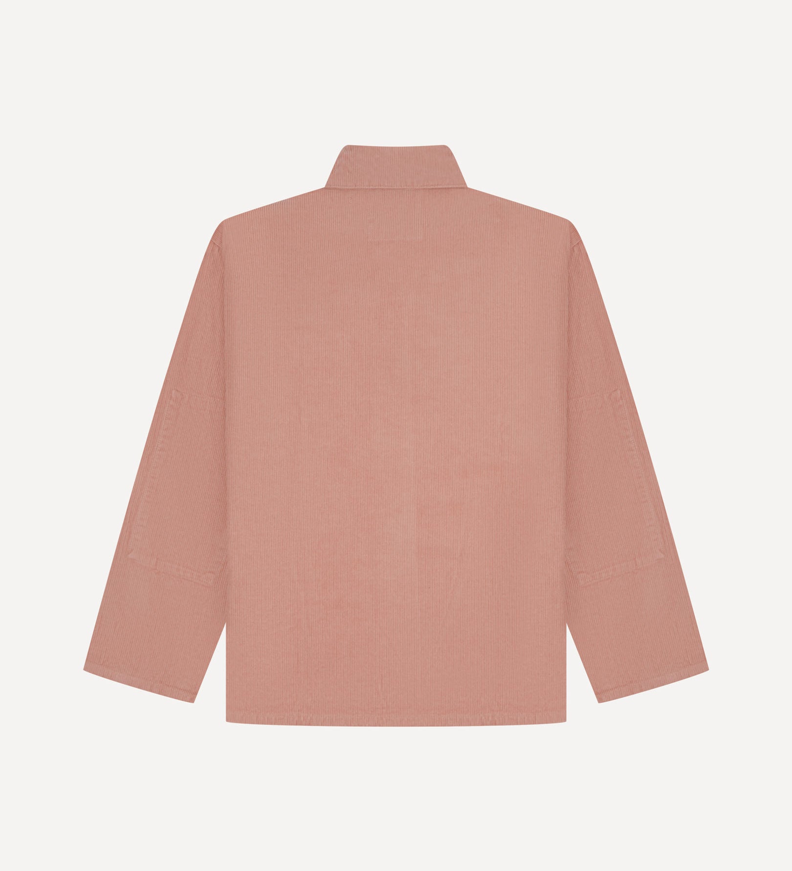 Back view of dusty pink, buttoned corduroy overshirt with view of reinforced elbow area and boxy silhouette.