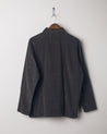 Full-length rear view of #3001, faded black-coloured corduroy over shirt with reinforced elbows.