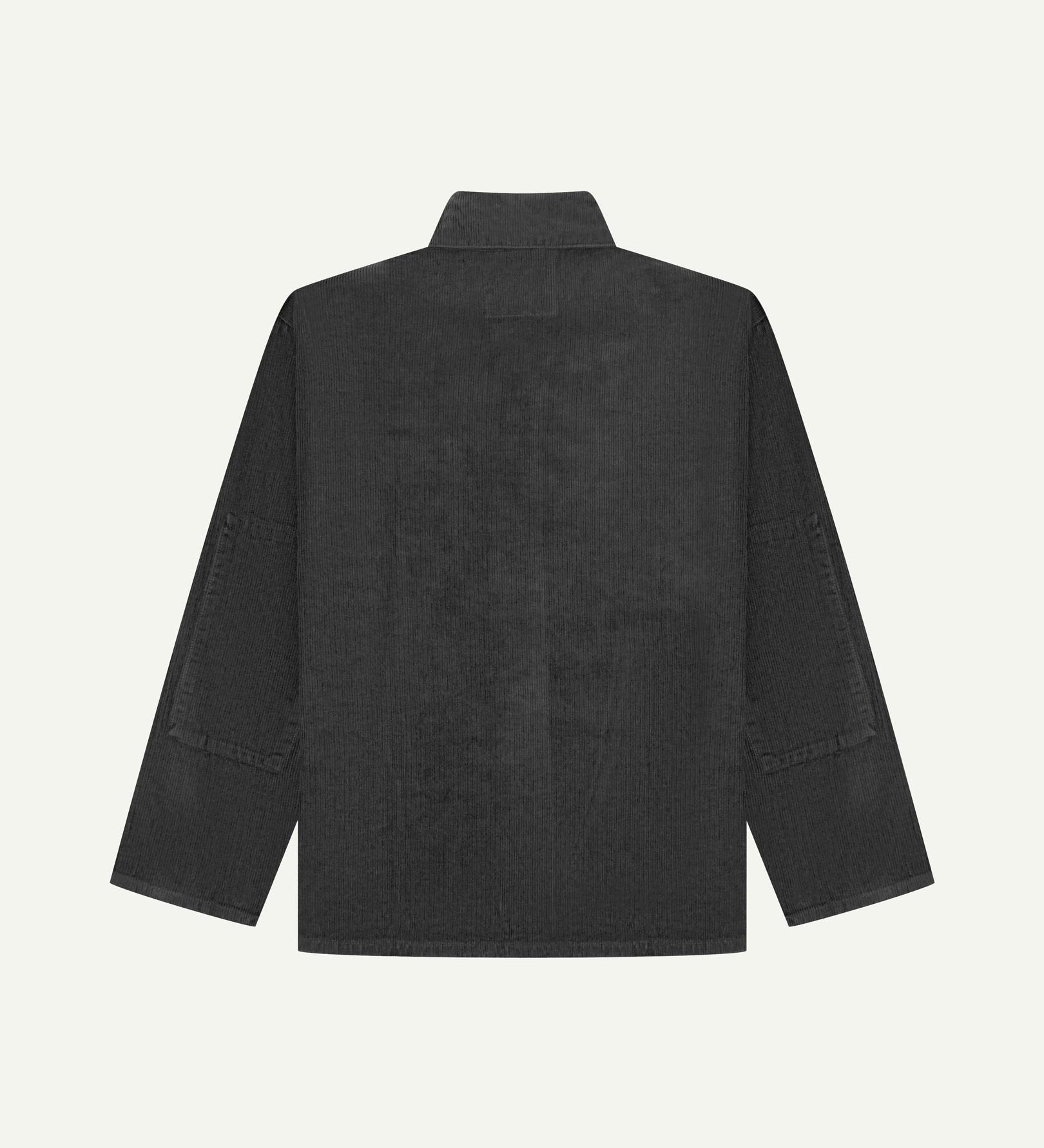 Back view of faded black, buttoned corduroy overshirt with view of reinforced elbow area and boxy silhouette.