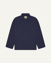 Front flat shot of midnight blue, buttoned organic cotton overshirt. Clear view of chest and hip pockets, corozo buttons and Uskees branding label.