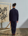 Full-length rear view of model wearing #3001, 'midnight-blue' corduroy over shirt with reinforced elbows.