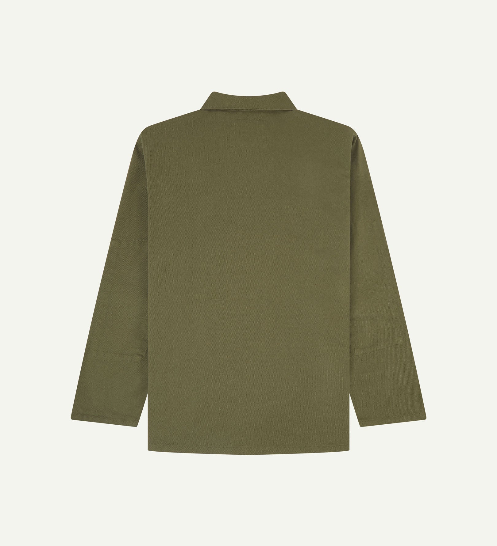 Reverse of moss-green buttoned organic cotton drill overshirt from Uskees. Showing reinforced elbows and boxy silhouette.