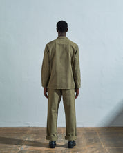 Full-length rear view of #3001, moss-green-coloured organic cotton-drill over shirt with reinforced elbows.