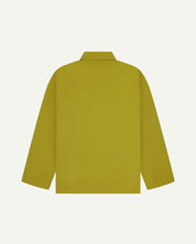 Reverse of yellow-green pear-coloured buttoned organic cotton drill overshirt from Uskees. Showing reinforced elbows and boxy silhouette.