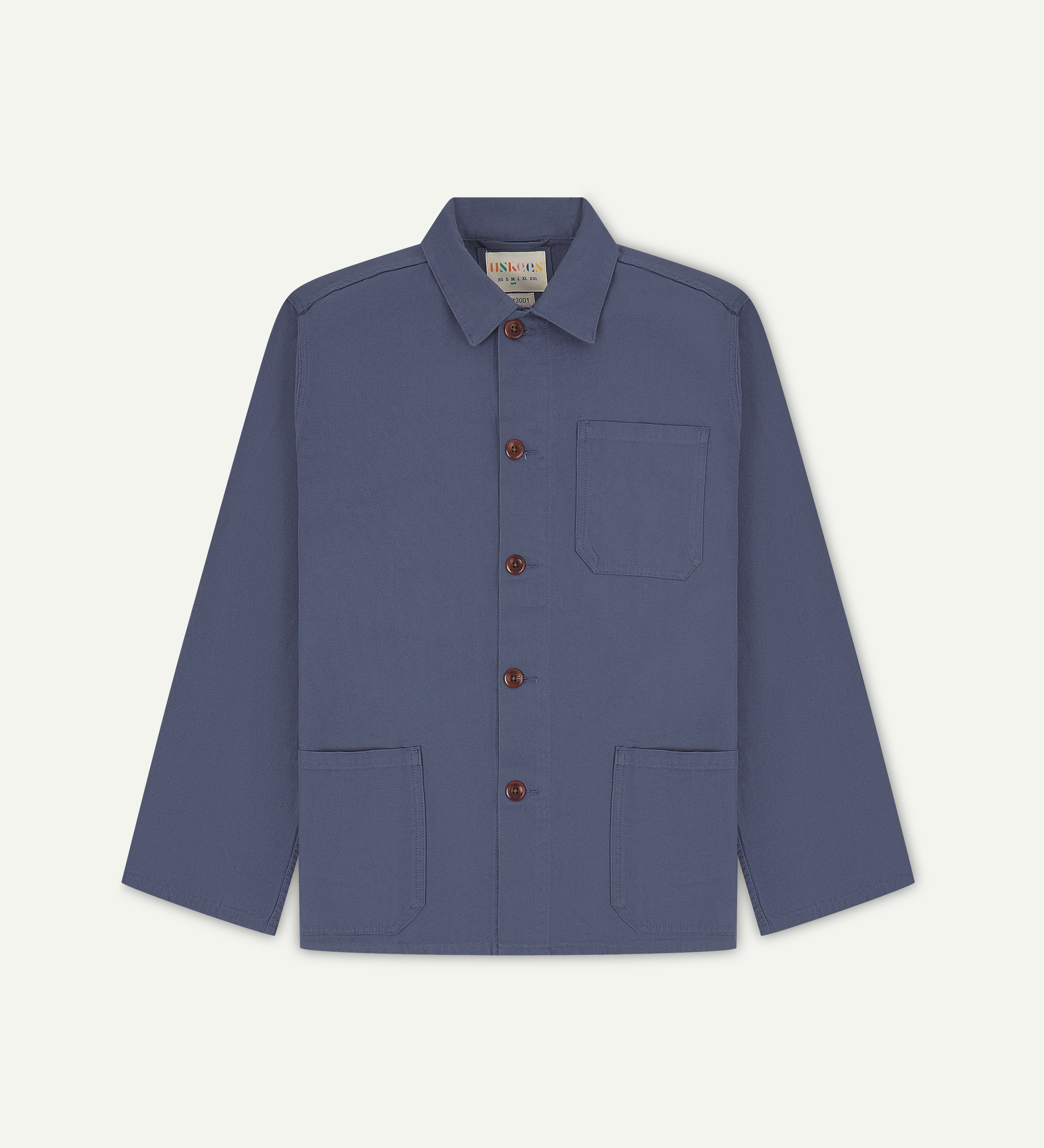 Front flat shot of teal blue men's overshirt with buttons done up and showing uskees neck label