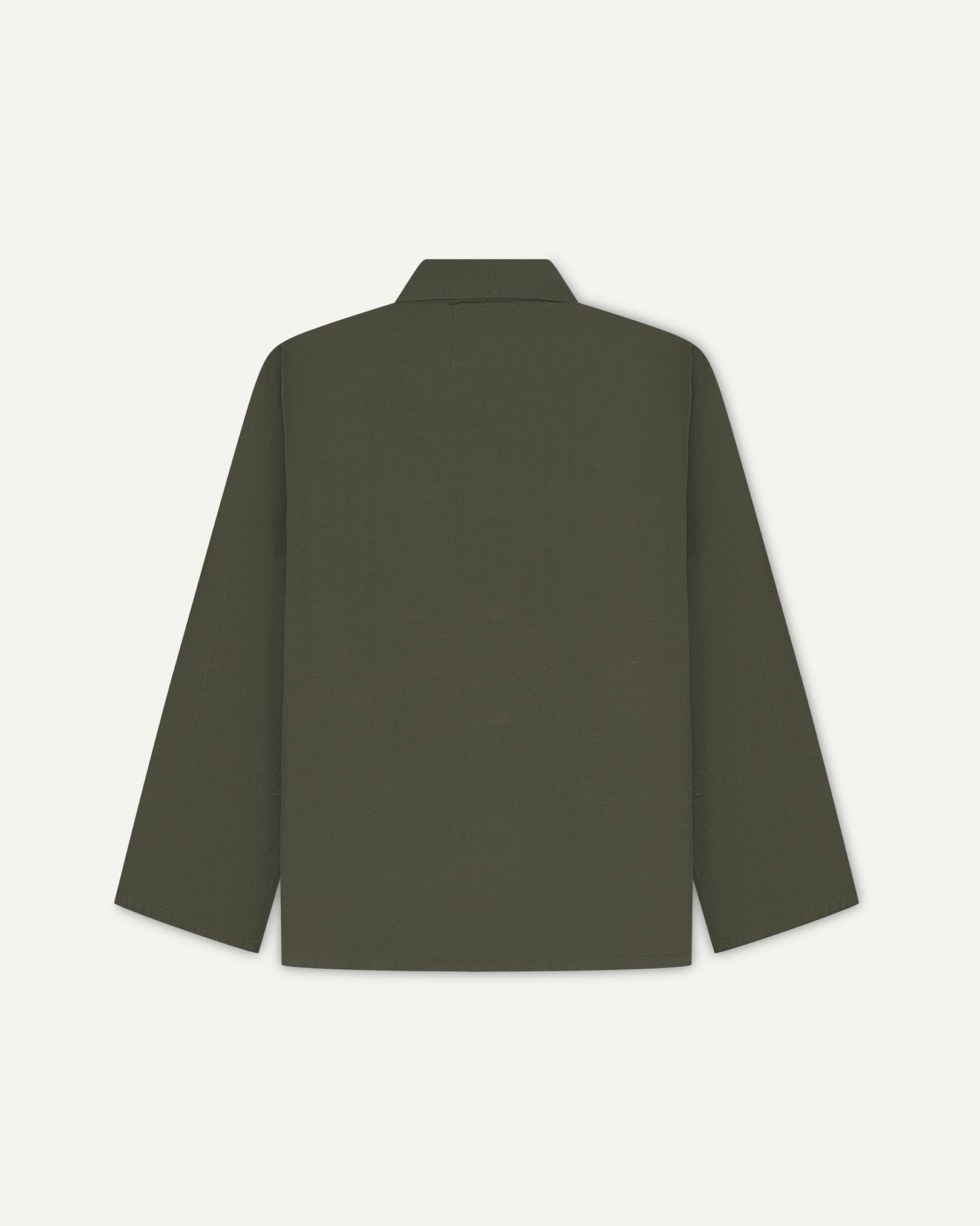 Back view of vine green, buttoned organic cotton overshirt with view of reinforced elbow area and boxy silhouette.