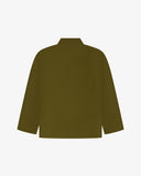 Back view of Uskees green corduroy overshirt for men on a white background