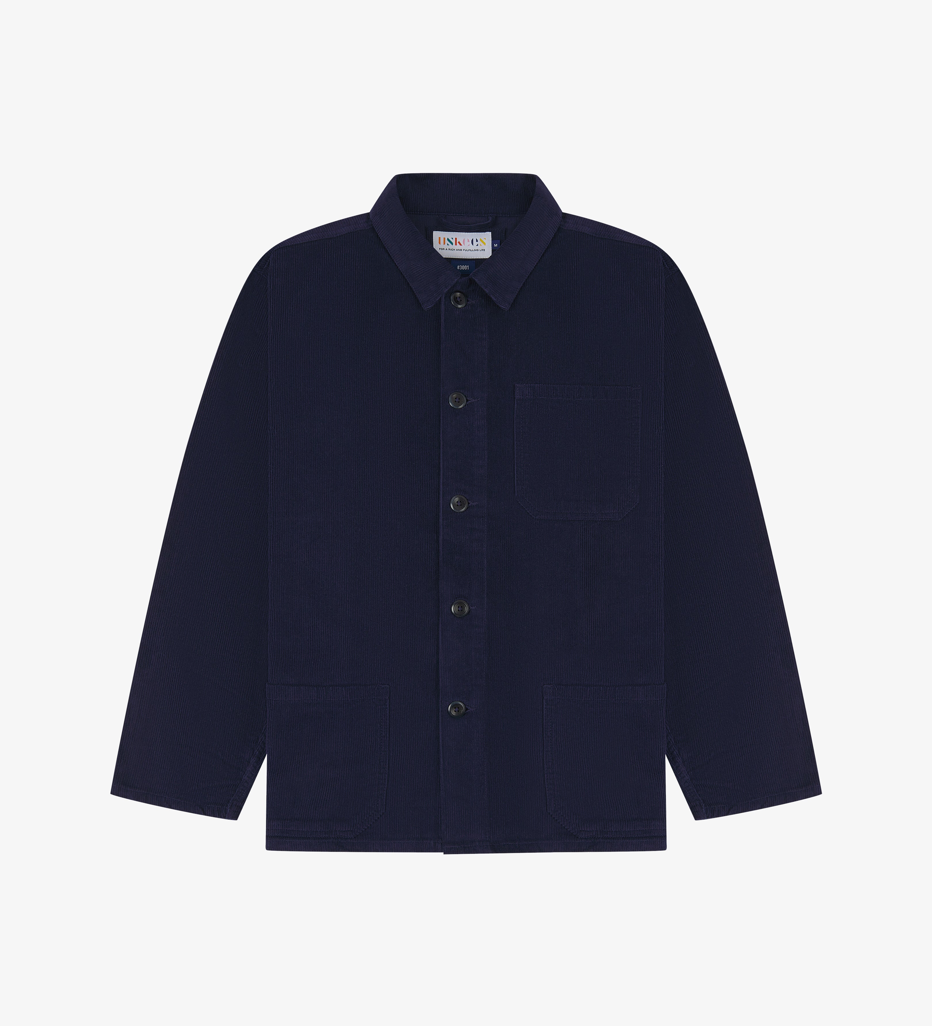 Front, flat shot of an Indigo blue corduroy overshirt buttoned up presented on a light gray background