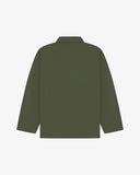 Back view of coriander-green, buttoned organic cotton overshirt with view of reinforced elbow area and boxy silhouette.