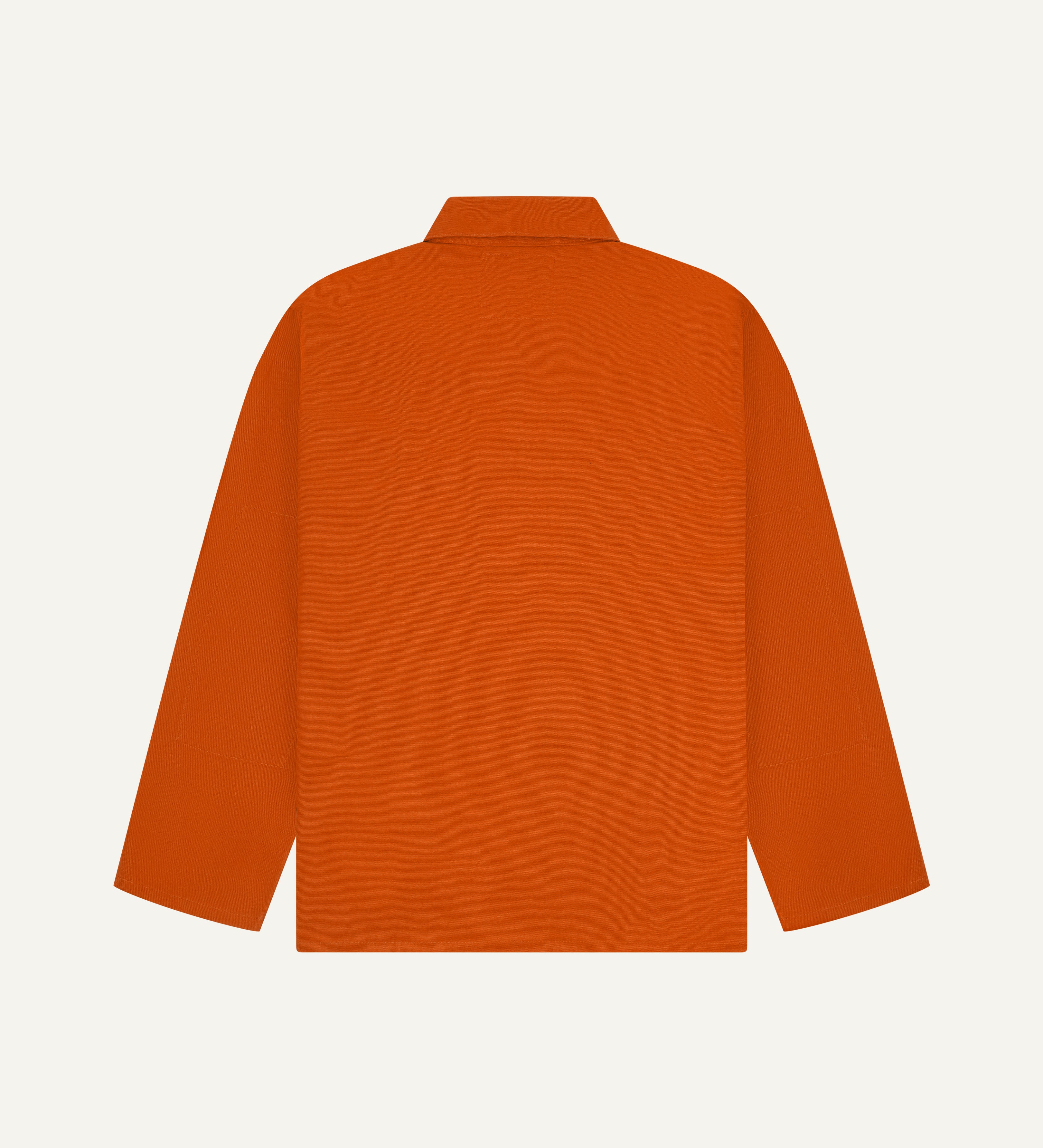 Back view of an uskees orange men's organic cotton shirt jacket