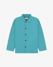 Front flat shot of turquoise blue Uskees overshirt with brown buttons on a light gray background
