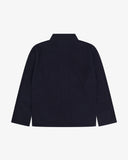 Back view of an Uskees midnight blue corduroy shirt-jacket for men presented on  a white background.