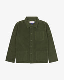 Front view of Uskees green corduroy shirt-jacket for men showing button details on a white background.
