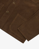 Close up view of Uskees brown cord shirt jacket for men showing the front pockets and cuff detail.