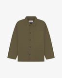 Green/brown shirt showing the Uskees brand label, collar and 3 front pockets on a white background.