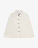 Front flat view of an Uskees cream shirt jacket for men showing the front pockets and Corozo buttons.