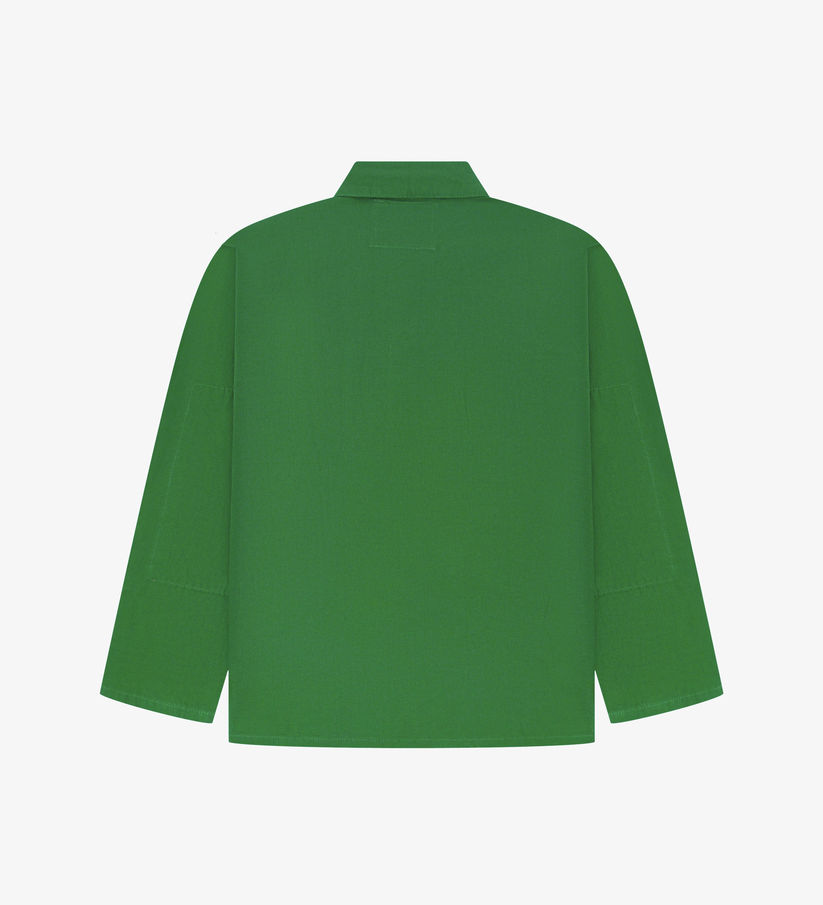 Back view of mint green, buttoned organic cotton overshirt with view of reinforced elbow area and boxy silhouette.