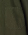 Close-up of #3002 vine green, organic cotton zip jacket focussing on the breast pocket.