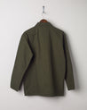 Full-length back view of the #3002 vine green zip jacket displayed on a hanger, showing reinforced elbows and simple silhouette.