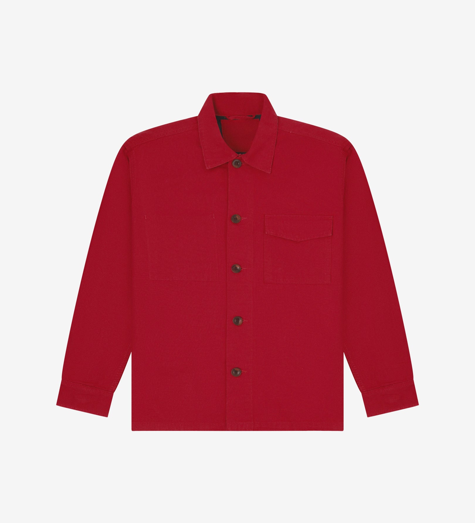 Berry red buttoned organic cotton workshirt from Uskees with clear view of chest pocket and utilitarian silhouette.